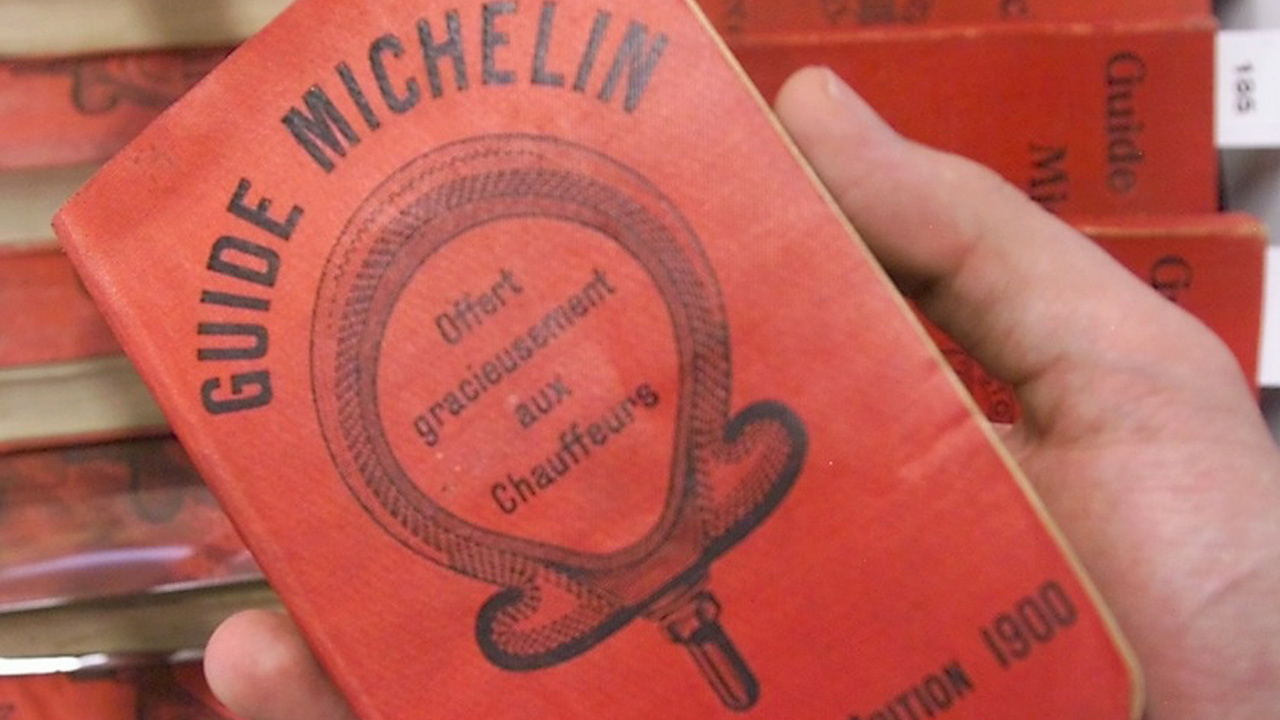 A rare first edition of the Michelin Guide. A small red book with French text; the first Michelin guide and the origin of the Michelin star