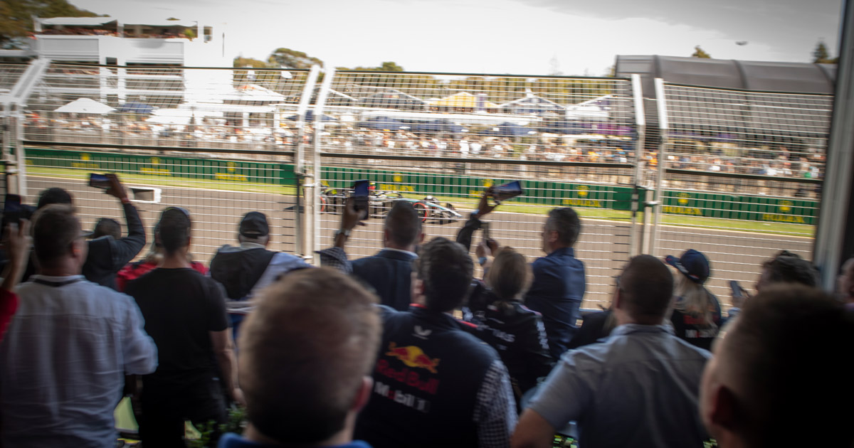F1 fans enjoy close up action on the Melbourne home straight in a private suite