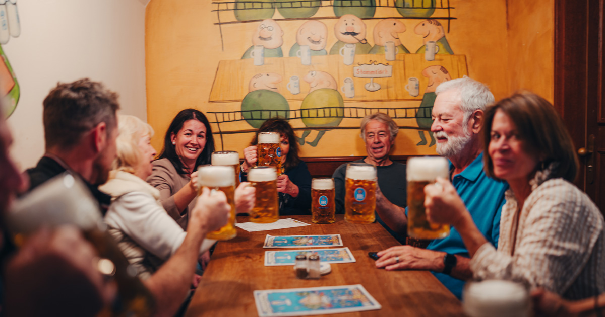 Prost! To delicious beer, new friends and lifelong memories. HunterMoss guests toasts frothy steins of beer as part of a luxury tour of Germany
