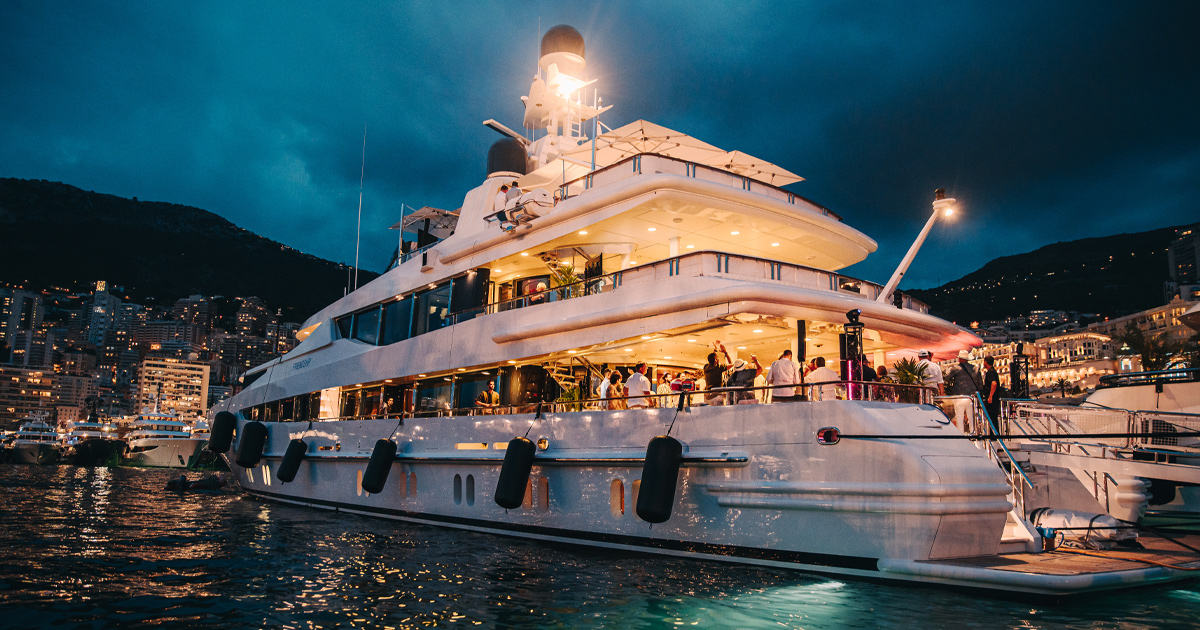 The HunterMoss yacht is illuminated by night in Port Hercules, Monaco