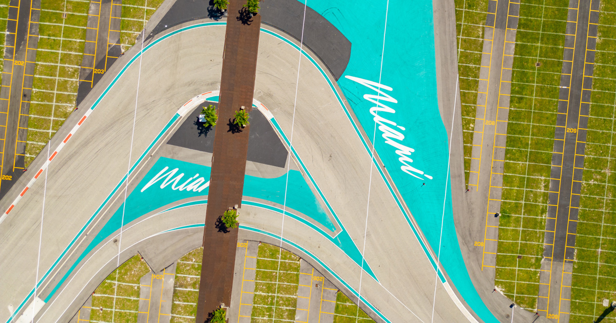A hairpin corner at the Miami F1 circuit with ‘Miami’ written in white on teal