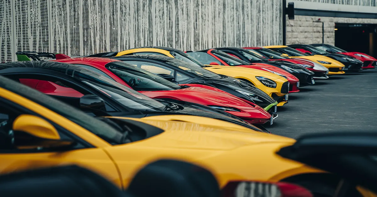 The HunterMoss fleet of supercars neatly parked side by side.