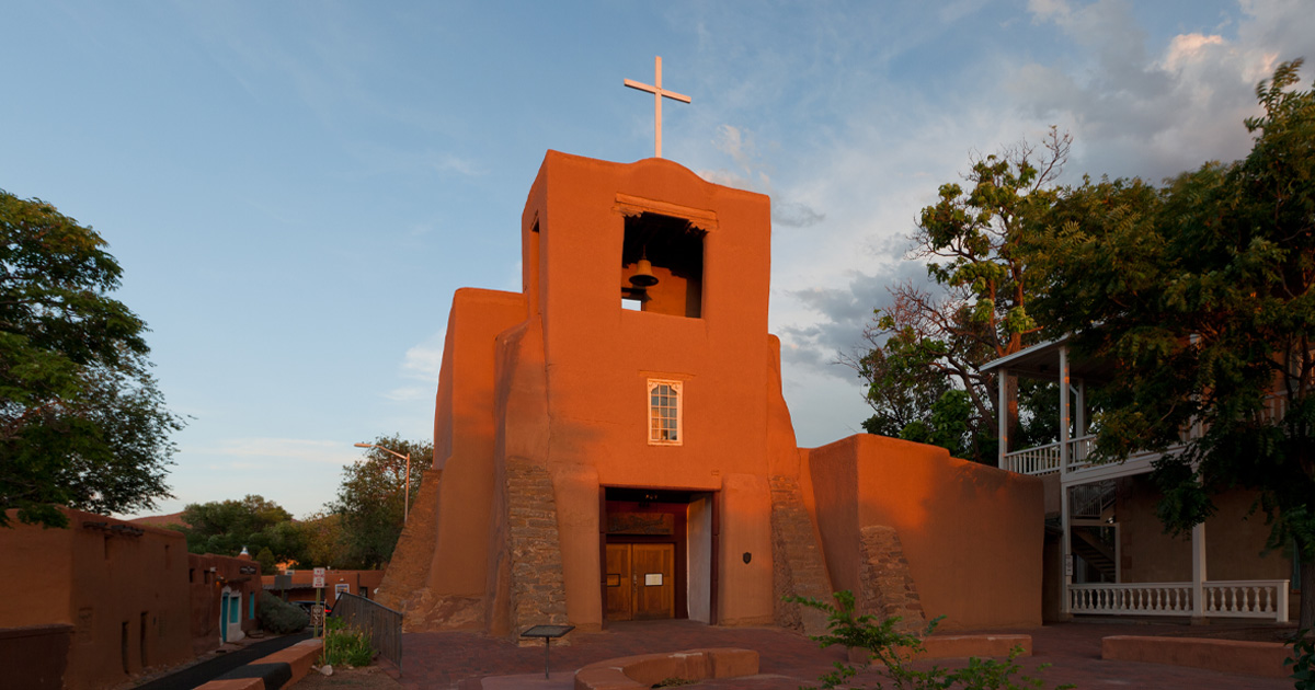 The perfect city in which to simply stroll and admire the views. An Adobe belltower in Santa Fe in the evening sun