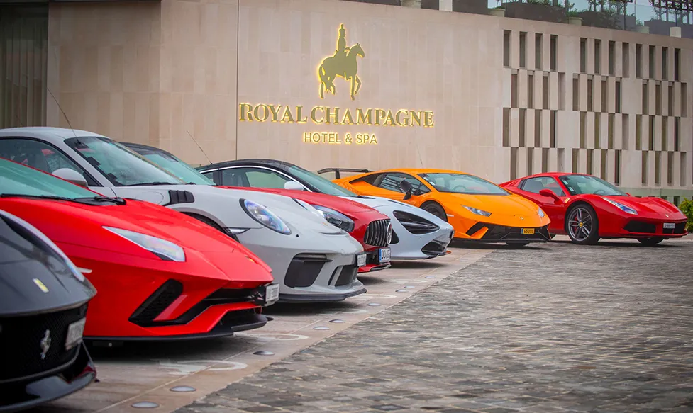 The HunterMoss fleet of supercars parked outside the Royal Champagne Hotel and Spa in France