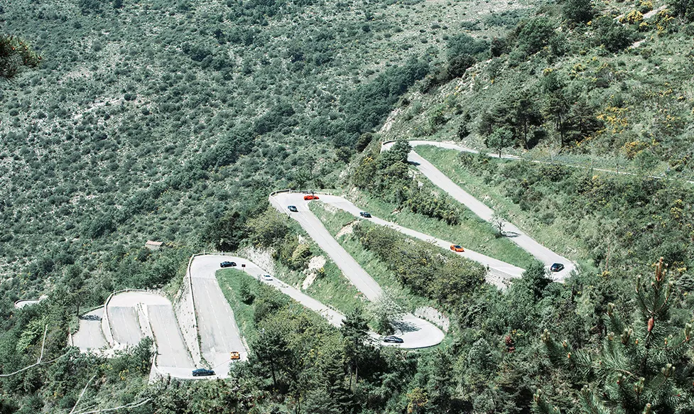 Supercars climb the dramatic balcony roads above Monaco on HunterMoss’ European supercar tour