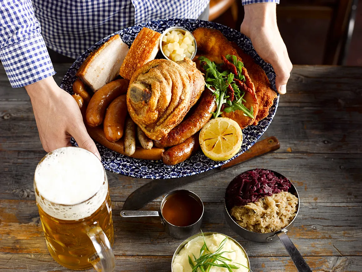 Enjoy traditional Bavarian cuisine and more on a luxury tour of Munich