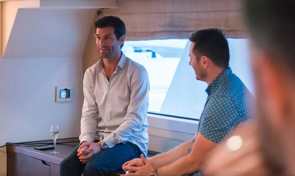 Mark Webber sits and talks with an HunterMoss guest during the Monaco Grand Prix weekend