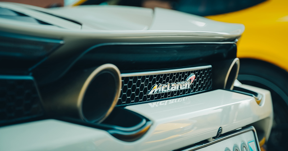 Incredible engineering with F1 inspiration is a McLaren hallmark. The rear grille with badge and twin exhaust tail pipes of a McLaren supercar